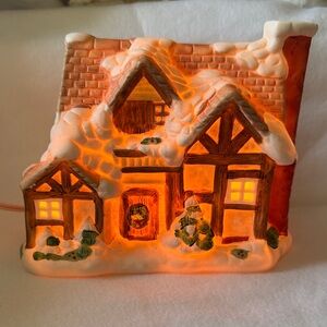 Charming Vintage Holiday Village House with Warm Glow
